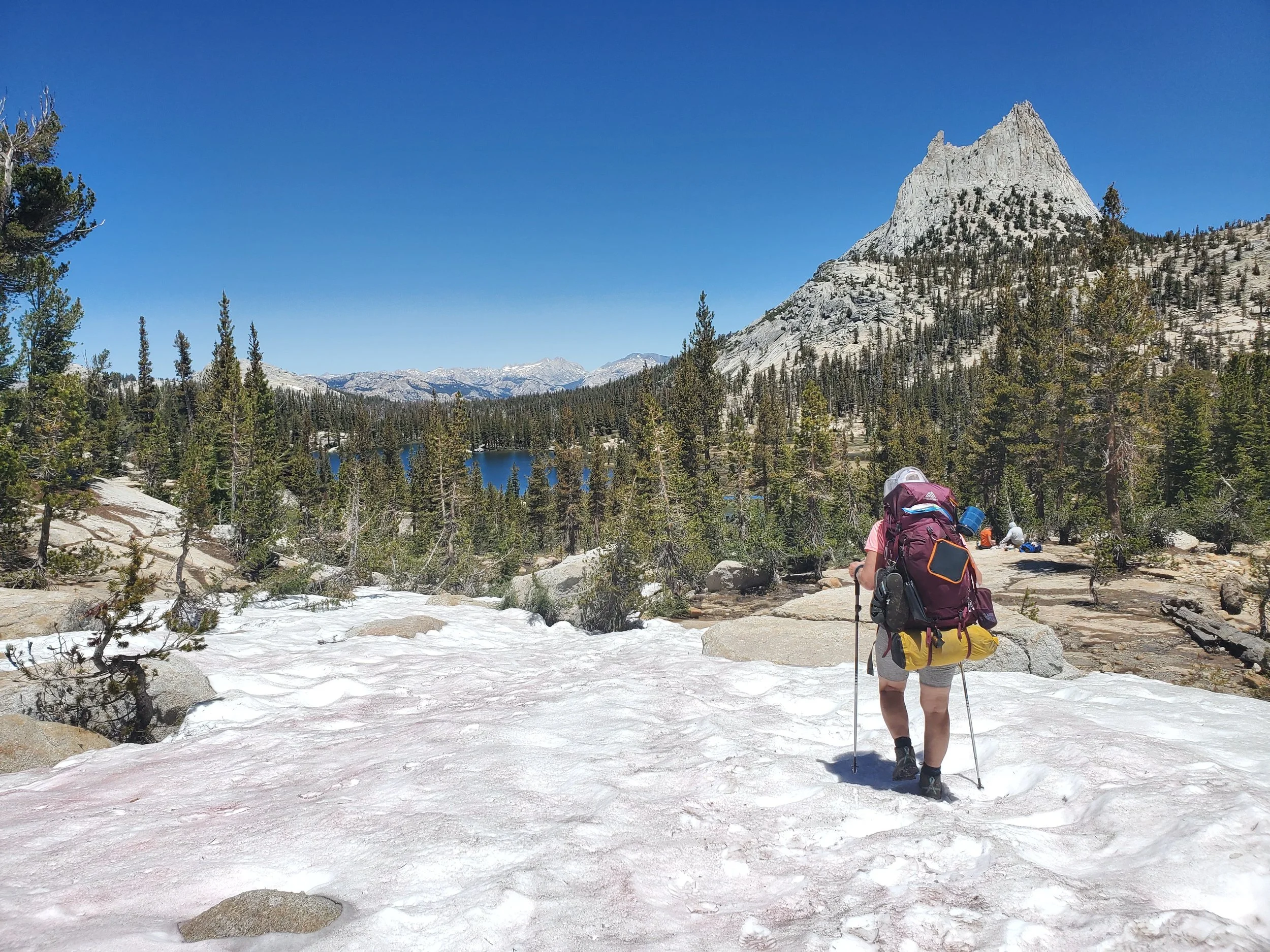 Woman hiking in snowy mountains